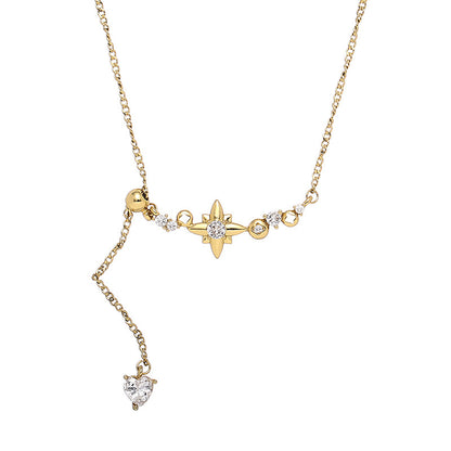 A vintage gold brass plated necklace with a zircon-inlaid star pendant and an extended chain.